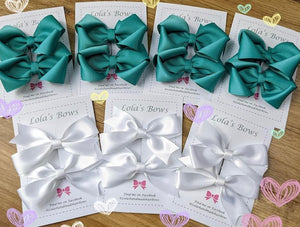 White Exam Bows